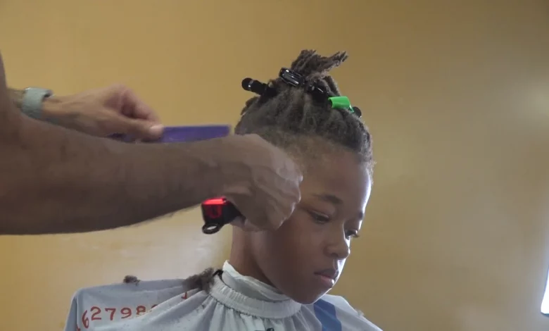 Alpha Phi Alpha Fraternity, Inc. provides free haircuts for children