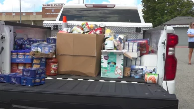 Fans trade in food items for a ticket to the Salem Red Sox game