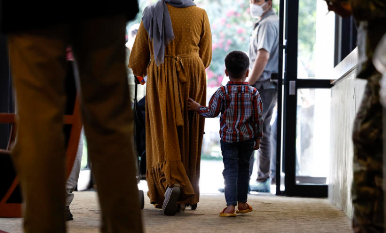 Afghan families start U.S. resettlement process at repurposed conference center after traumatic ordeals